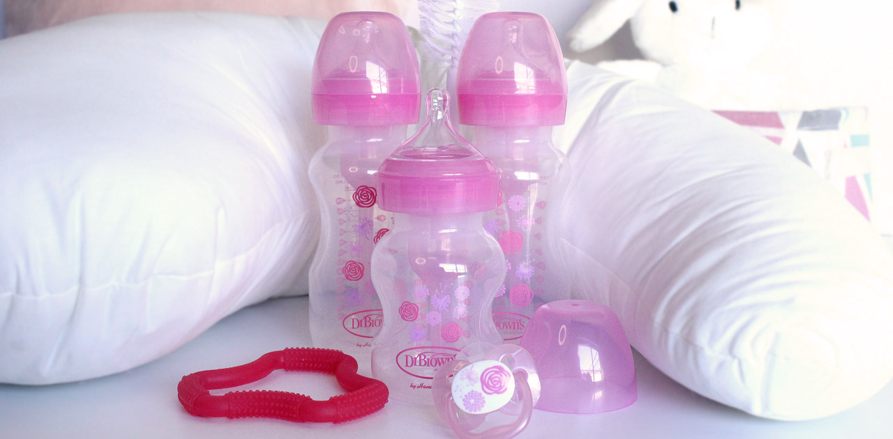 Set rosa para recién nacido con biberones de silicona